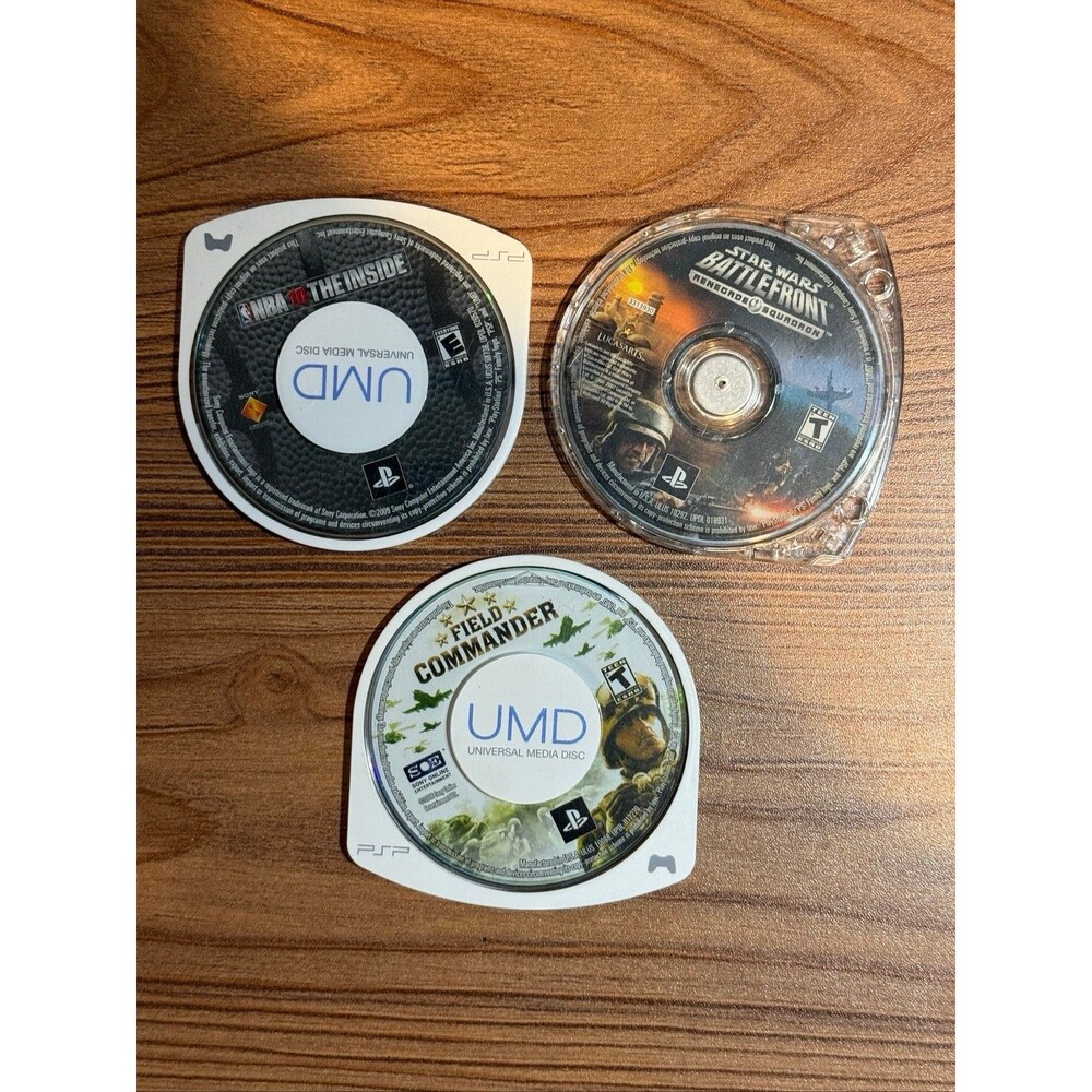 (3) Game lot. Featuring Star Wars Battlefront Renegade Squadron Sony PSP 2007